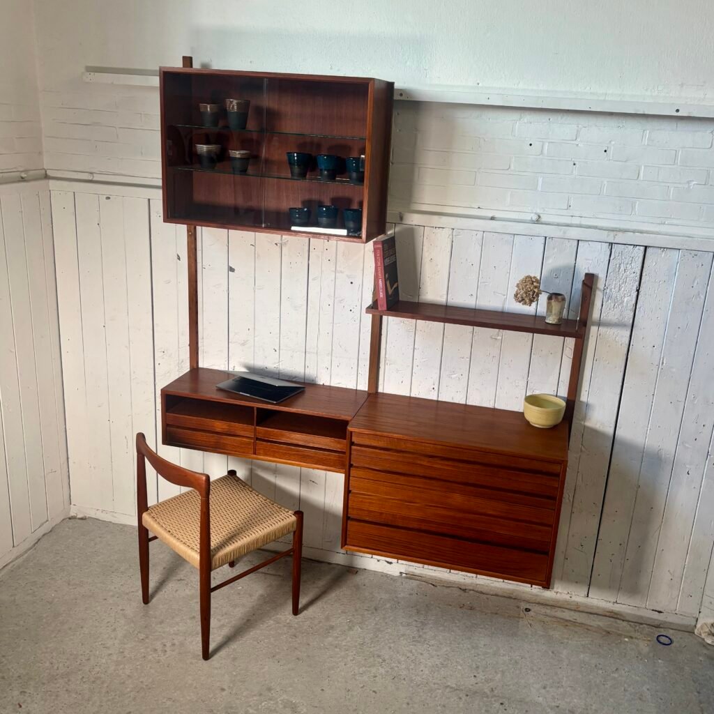 Poul Cadovius teak wall-mounted modular shelving system with drawers and glass cabinet, Denmark, 1960s