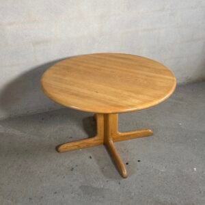 Niels O. Møller round oak dining table with pedestal base and extension leaf, Denmark, 1960s
