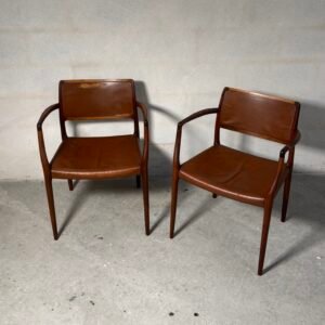 Pair of Niels O. Møller Model 65 armchairs in rosewood with original cognac leather, Denmark, 1960s