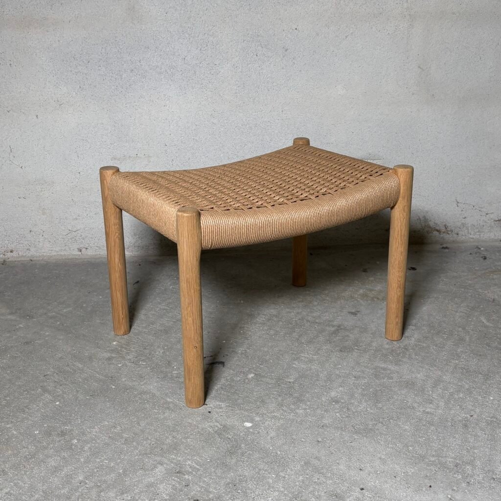 Oak footstool attributed to Niels O. Møller with handwoven papercord seat and soap-finished frame, Denmark